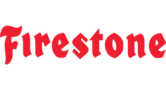 The image displays the logo for Firestone in red stylized text on a plain green background. The font is bold and italicized with a dynamic feel.